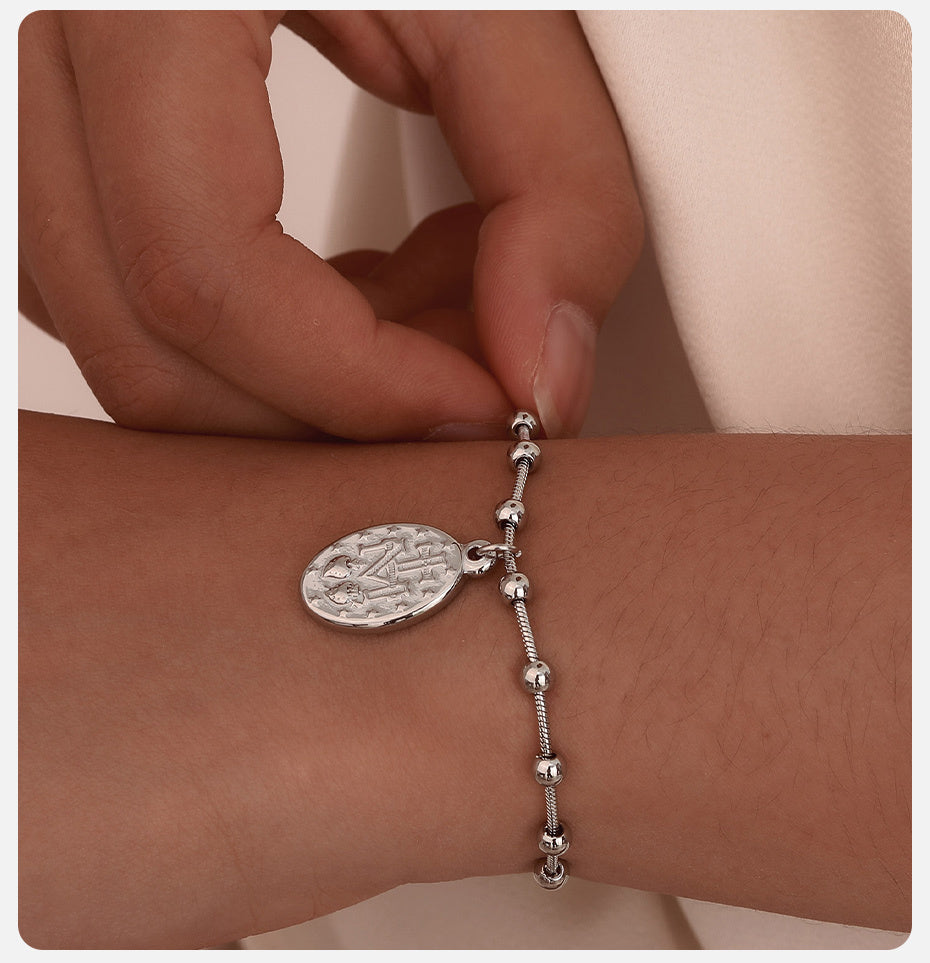 Pulseira de N.S das Graças, Aço inox